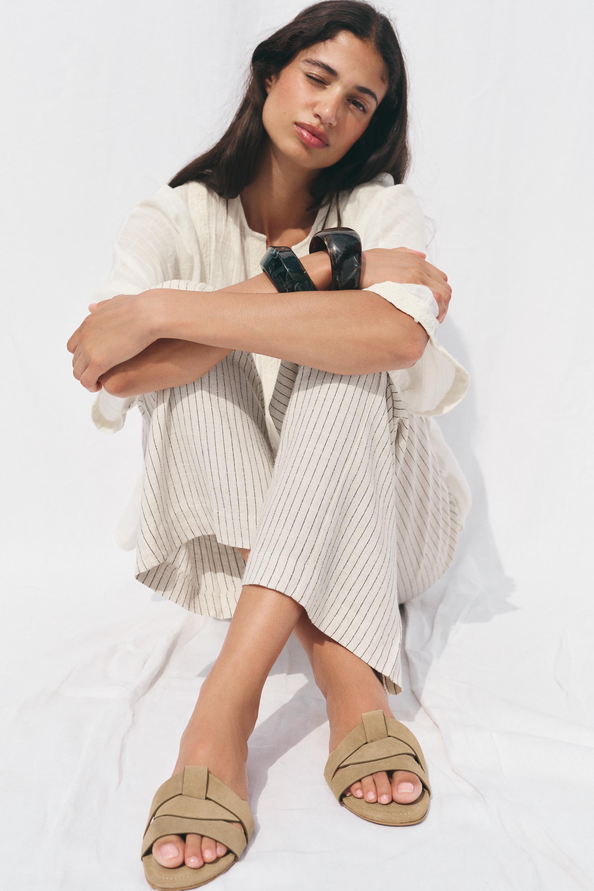 SUEDE CROSSED SLIDE SANDALS